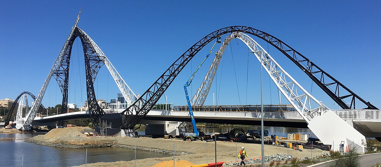 Workers carrying out maintenance on a bridge
